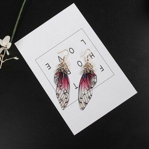 ** BRAND NEW ** BEAUTIFUL PURPLE FAIRY WING EARRINGS